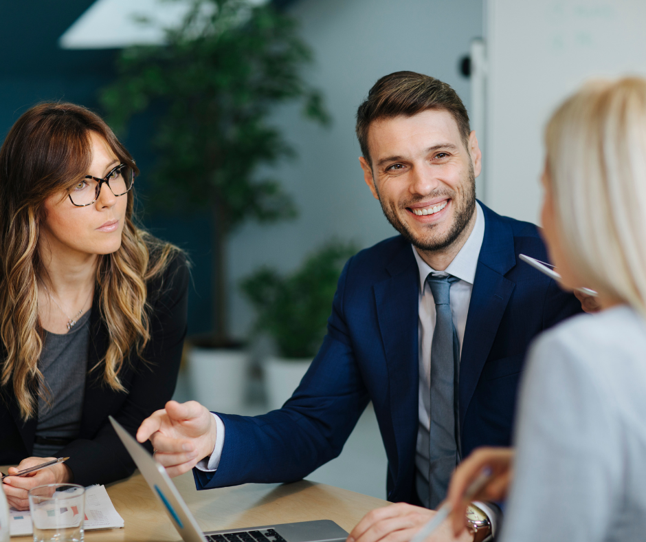 Tax advisor helping small business owners with their tax preparation