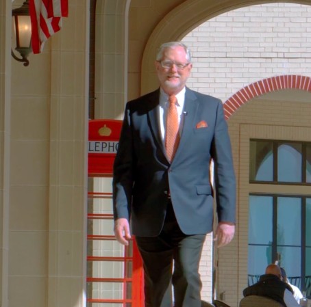 Founder of Woodlands Tax Advisors walking down hallway with colleague